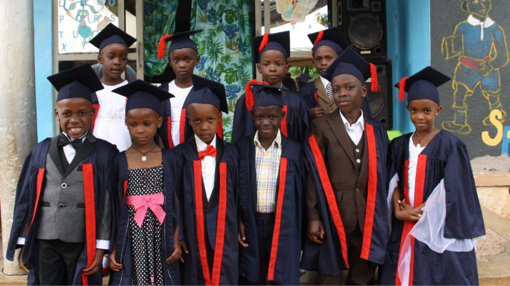 Kids in graduation robes